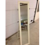 Cream cheval mirror.