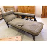 A vintage Chaise Lounge in need of restoration.