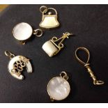 6 x 9ct gold and Mother of Pearl charms