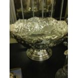 Silver plate embossed punch bowl.