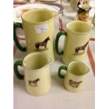 A set of graduated jugs by Heron Cross Pottery decorated with horses