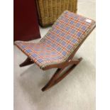 A vintage tartan upholstered gout stool