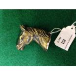 A novelty horses head vesta case.