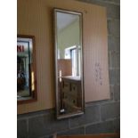 A gilt framed rectangular mirror 120 x 36cm