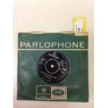 A Beatles single 'I Want to Hold Your Hand' on the Parlophone label, 7XCE17559 1963. Very good