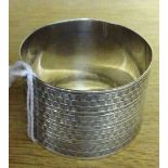 A silver napkin ring.