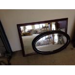 2 x dark wood framed mirrors - 1 oval and 1 rectangular