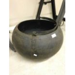 A large Indian vintage cooking pot/cauldron with handle, 48cm diameter