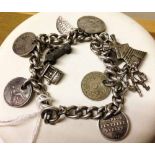 Heavy silver vintage charm bracelet - each link stamped with the Lion standard mark (possibly