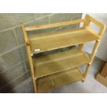 A wooden display shelf unit.