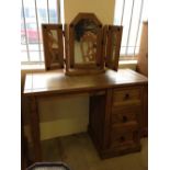 Pine dressing table with 3 section mirror and Corona 2-over-2 pine chest of drawers.