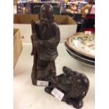 2 oriental wooden carved figures, both as found.