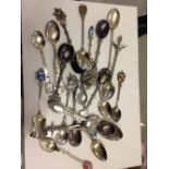 Collection of 22 silver/continental silver collectors tea spoons.