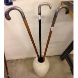 3 continental silver topped walking sticks.