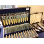 2 vintage sets of boxed cutlery comprising butter knives and fish knives & forks with faux ivory