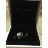 Pandora sterling silver openwork leaves charm in original box.