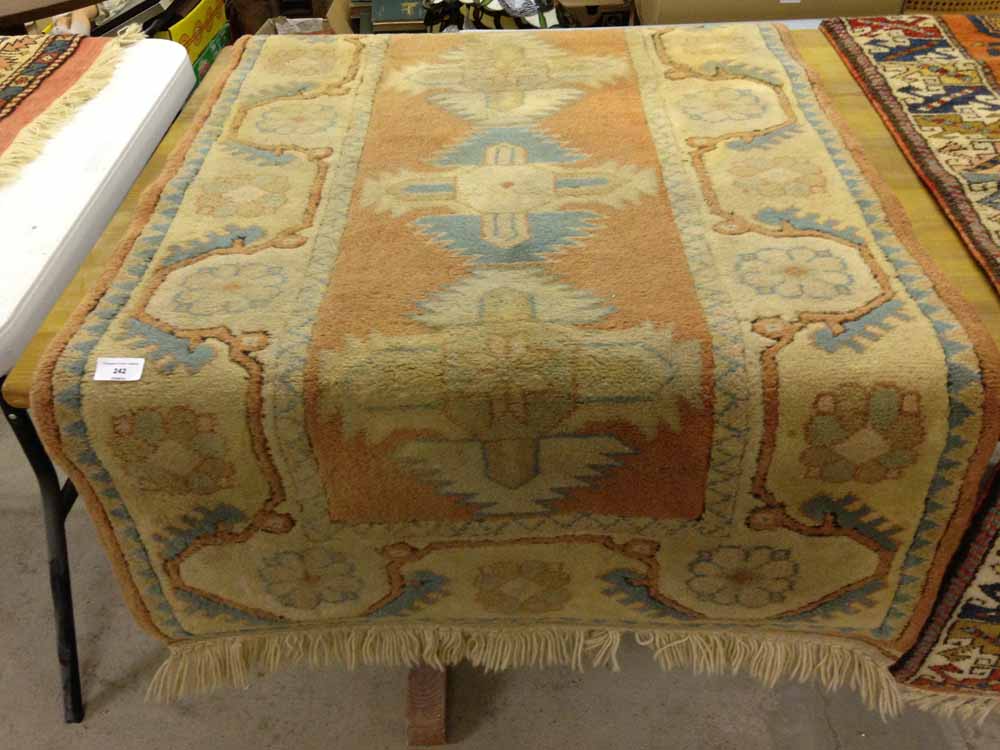 A vintage Milas Turkish wool rug. 135 x 80cm (1.08m²).