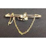 A vintage 9ct gold bar brooch with shamrock design set with seed pearls.