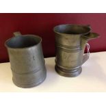 2 Pewter mugs: one Victorian pint measure marked VR71 the other marked GR55.