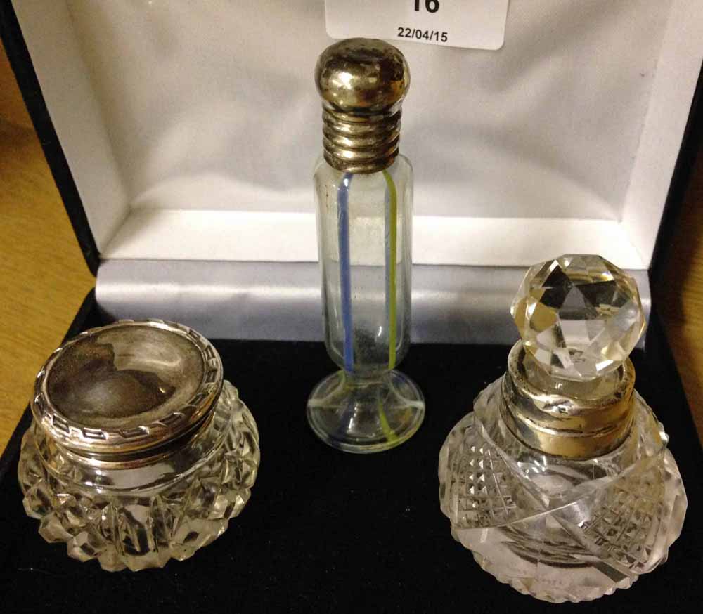 A HM silver lidded rouge pot - Birmingham 1912, a HM silver rimmed scent bottle and a phial shaped