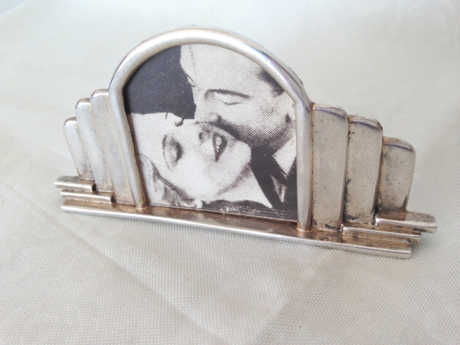 A miniature Art Deco continental silver picture frame approx. 10 x 4.5cm. Makers mark KS.