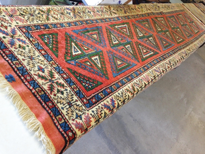 A vintage turkish wool rug. 350 x 96cm (3.36m²).