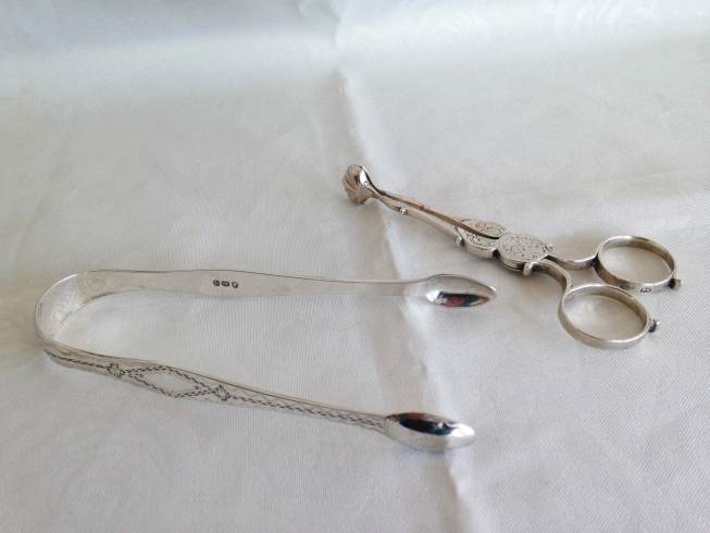 A pair of silver Georgian bright out sugar tongs, London 1791. Makers mark IG. - Image 2 of 2