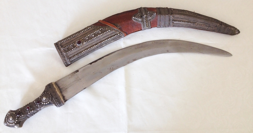 An antique circa 19th century middle eastern dagger/short sword with curved blade, approx 45cm (55cm