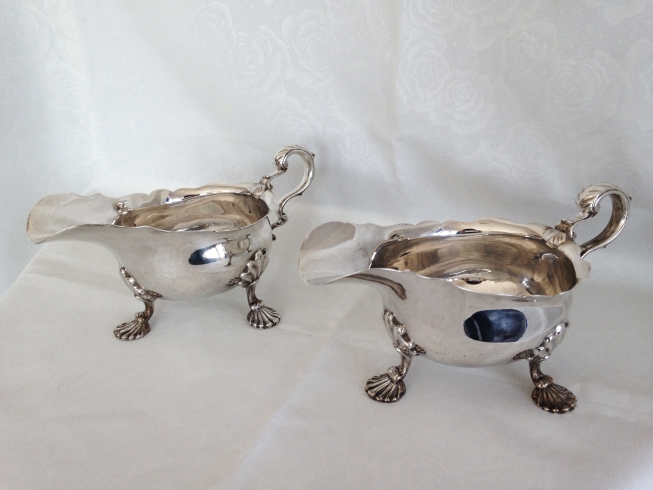 A matched pair (same maker) of George II style silver sauce boats on shell feet, Sheffield 1898 &