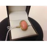 18ct gold 750 ladies ring with oval coral cabouchon, size N