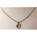 9ct HM necklace with open heart pendant set with green stone, weight approx. 2.6g