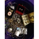 A container of costume jewellery.