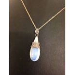 Moonstone & silver pendant on a silver chain.