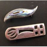 2 silver brooches, one in a Rennie MacIntosh style design & the other with abalone shell.