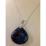 Blue & green polished stone pendant on a silver chain.