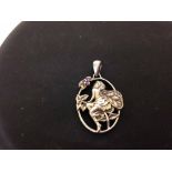 Pretty hallmarked silver pendant of a fairy set with 3 small amethysts.