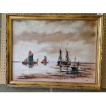 A gilt framed Jack Cox oil on board of sailing barges at Blakeney, Norfolk. 47 x 62cm.