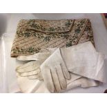 An 18th century embroidered gents waistcoat converted to a ladies clutch bag with a pair of