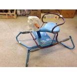 A vintage metal & plastic spring rocking horse c1960s.