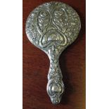 An Art Nouveau HM Silver hand mirror with 'Green Man' & flower decoration. Birmingham 1910, maker