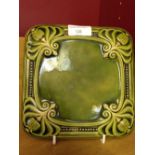 A Carter & Co Poole early ceramic pot stand/tile.