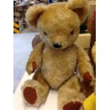 A vintage teddy bear in excellent condition, fully jointed mohair, possibly new pads. Original