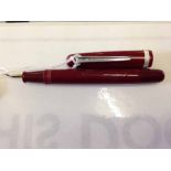 Mentmore 'Supreme' c1950s fountain pen. Maroon celluloid with chrome trim-cap has ‘Mentmore’ logo to