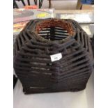 An antique tarred rope crab or lobster pot/creel.