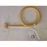 Antique ivory 'hammer' shaped teething stick and ring.