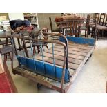 Vintage railway station porters flatbed luggage trolley.