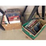 A box containing military books & magazines, with a box of military jig-saws.