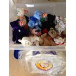 A quantity of 28 TY Beanie Bears and a Beanie Babies official club bag.