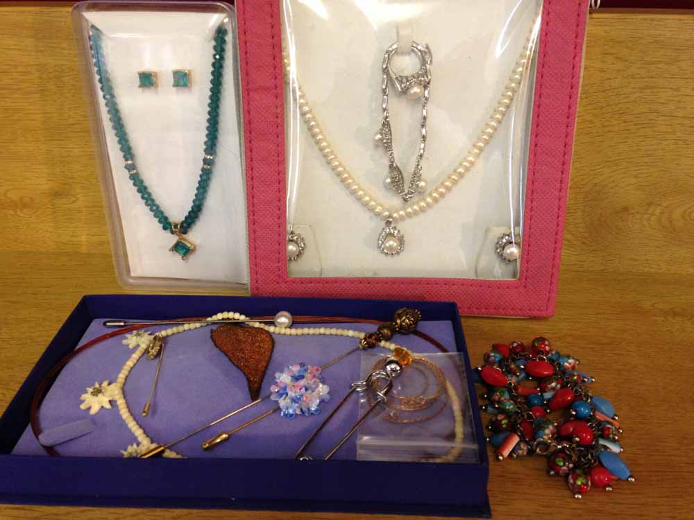 A quantity of costume jewellery to include boxed sets & hatpins.