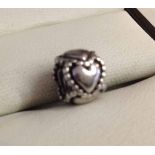 Pandora silver heart charm (circular).